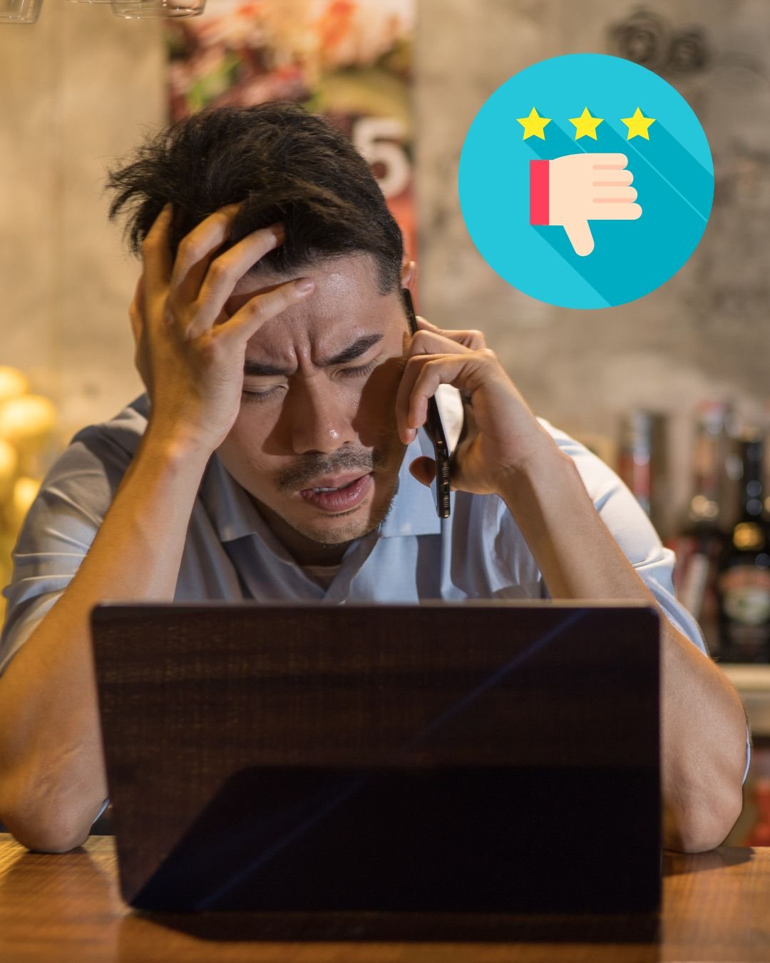 Picture of a restaurant owner looking frustrated and emotional as he reads his a poor Google Review while trying to keep up with all of his management tasks.